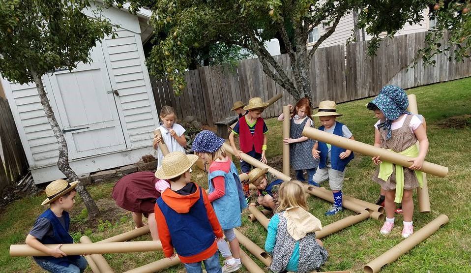 Photo of children in pioneer costumes.