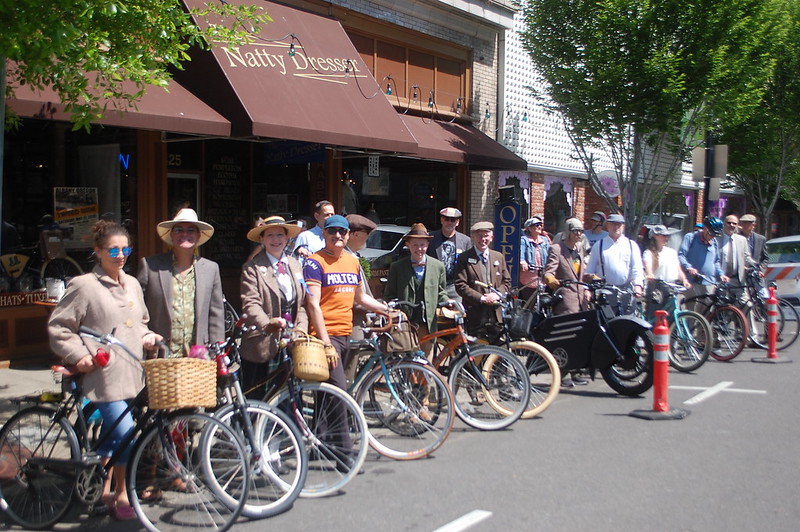 Photo of cyclists dressed in tweed.