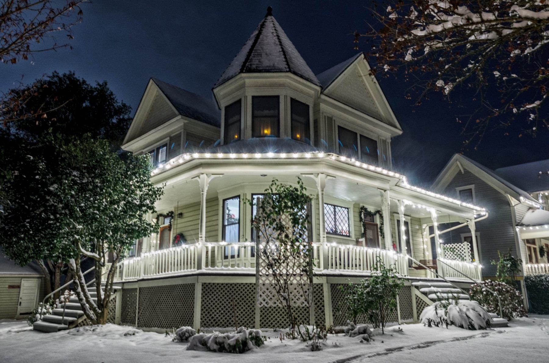 Photo of historic house with lights.