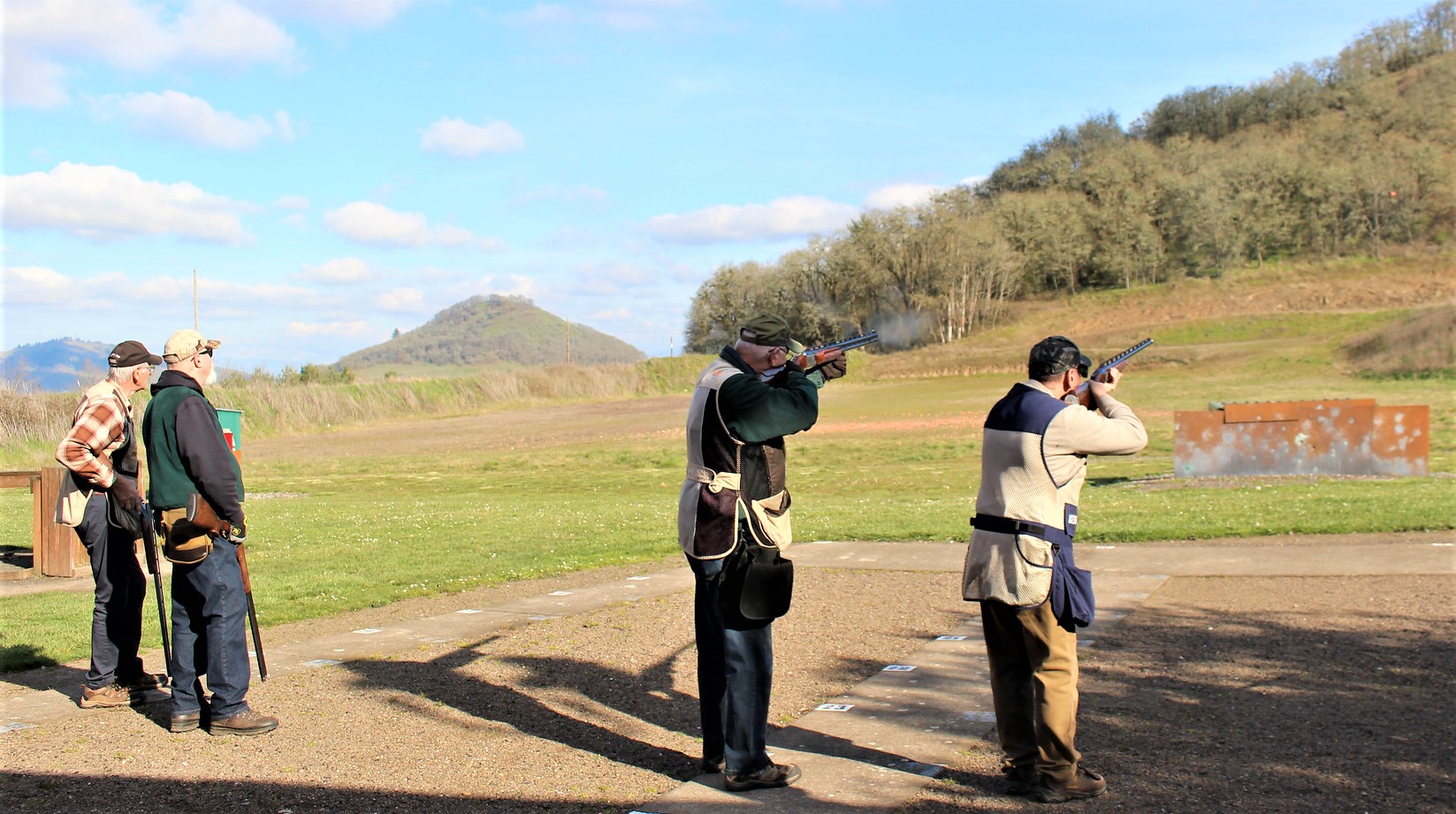 photo of people at gun target practice
