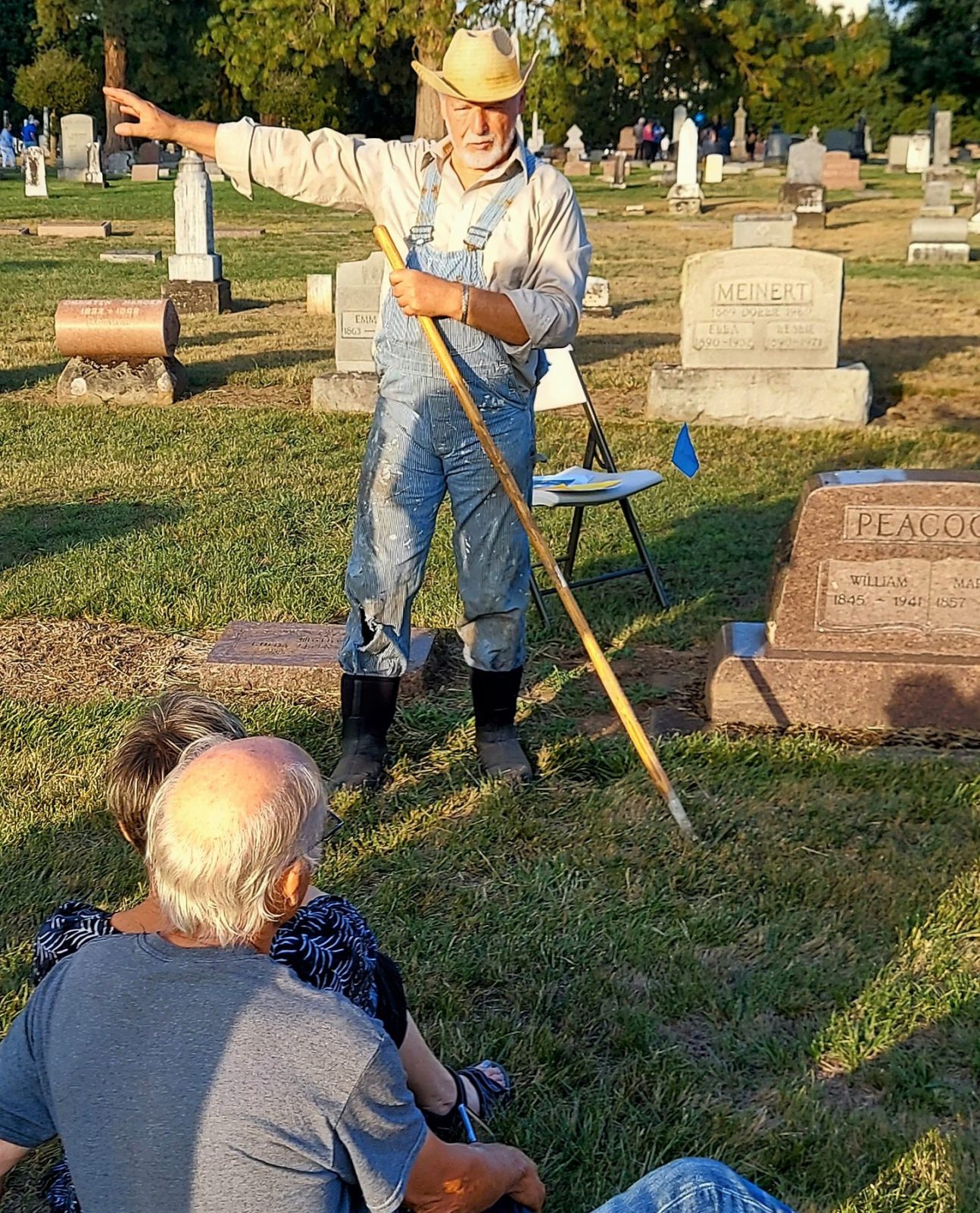 Photo of guide discussing history in cemetery