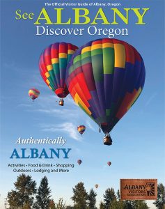 Cover of the 23-24 Visitor Guide with rainbow hot air balloons in a blue sky