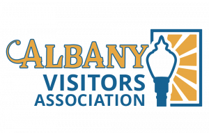 Albany Visitors Association Logo with street lamp and shining light