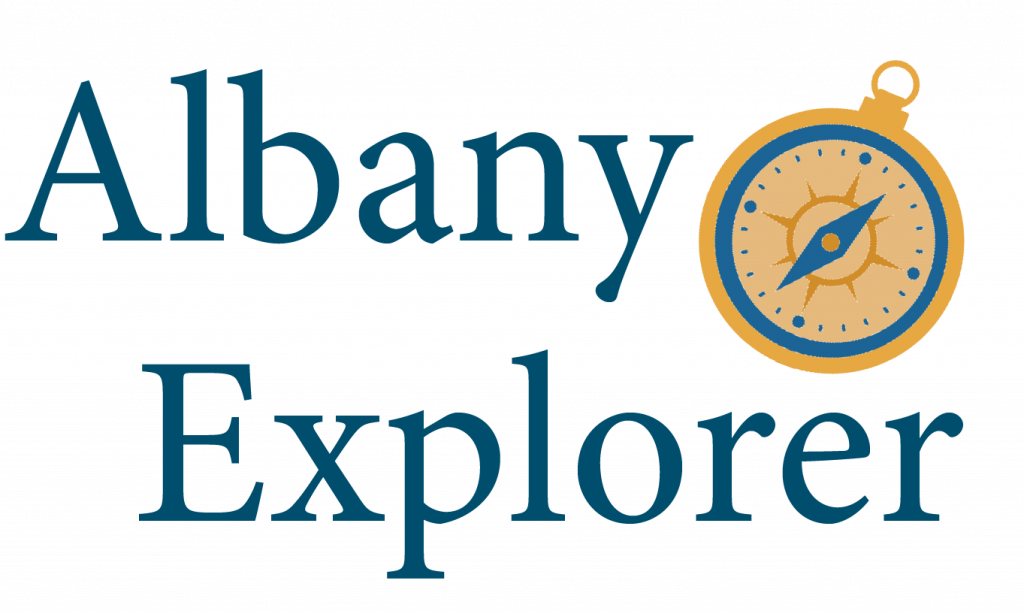 Albany Explorer logo with a compass